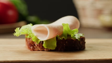 Making a Ham and Lettuce Sandwich