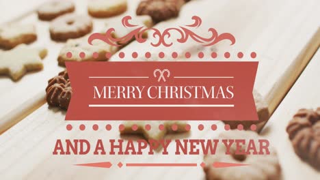 Animation-of-merry-christmas-text-over-cookies