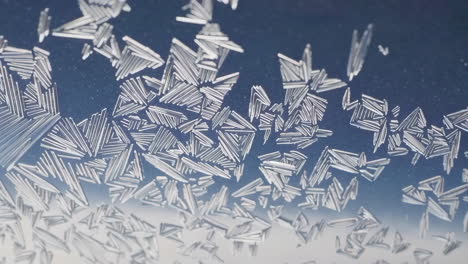 intricate frost patterns on a window pane