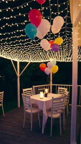 outdoor night party with balloons and lights
