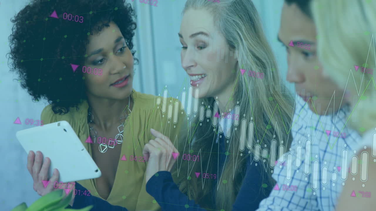Discussing data, diverse businesswomen with financial graphs animation in office