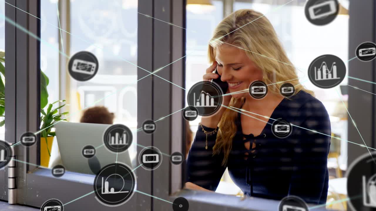 Animation of network of connections with icons over happy caucasian woman using smartphone