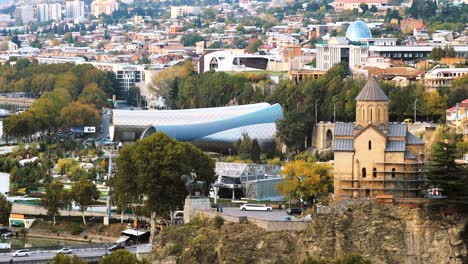 tbilisi, georgia. summer aerial view, cityscape . famous new modern landmarks justice house, bridge of peace, concert hall, rike park, presidential palace, cableway around kura river