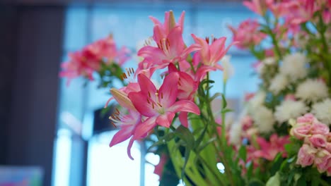 pink-and-white-flowers-decoration-at-the-entrance-of-hotel-close-up-shot,-Arc-shot