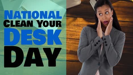 animation of national clean your desk text over worried businesswoman and wooden background