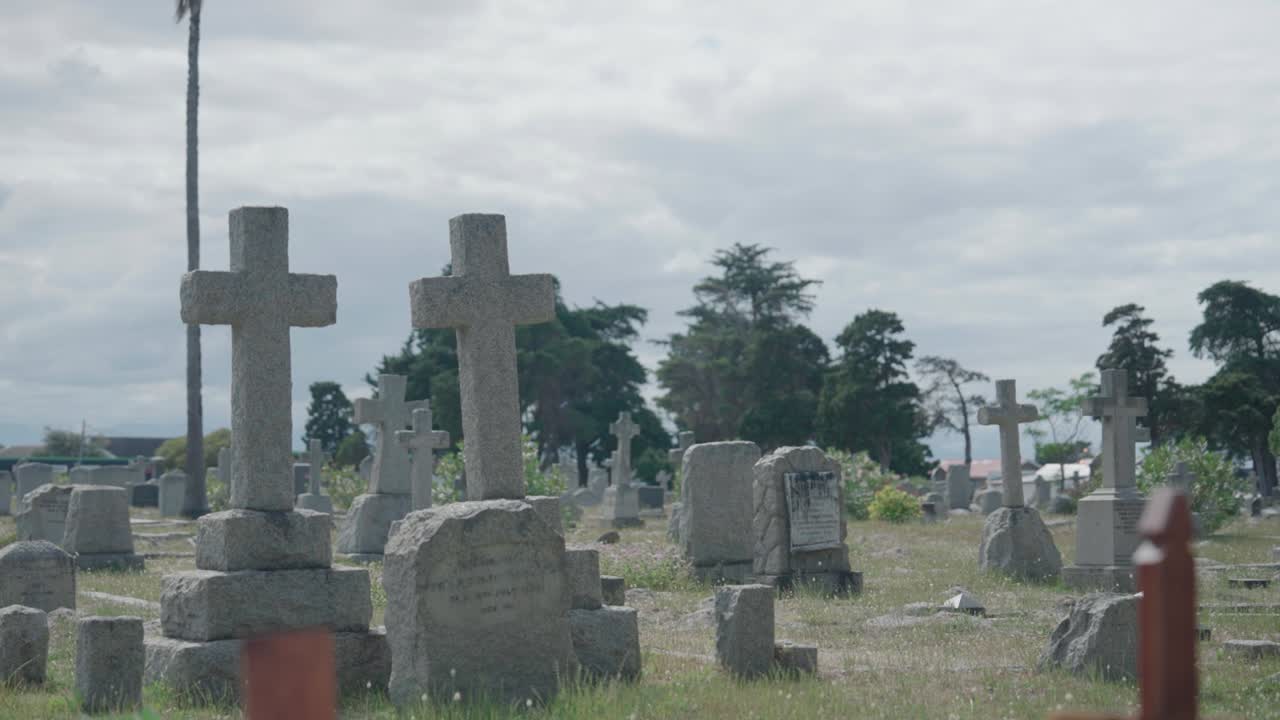 Close up of two cross headstones