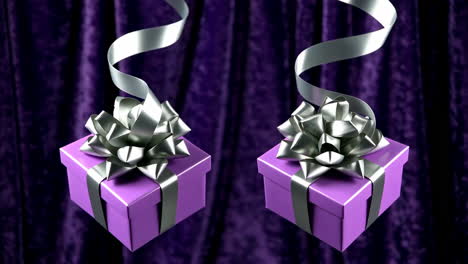 two purple gifts with silver bows