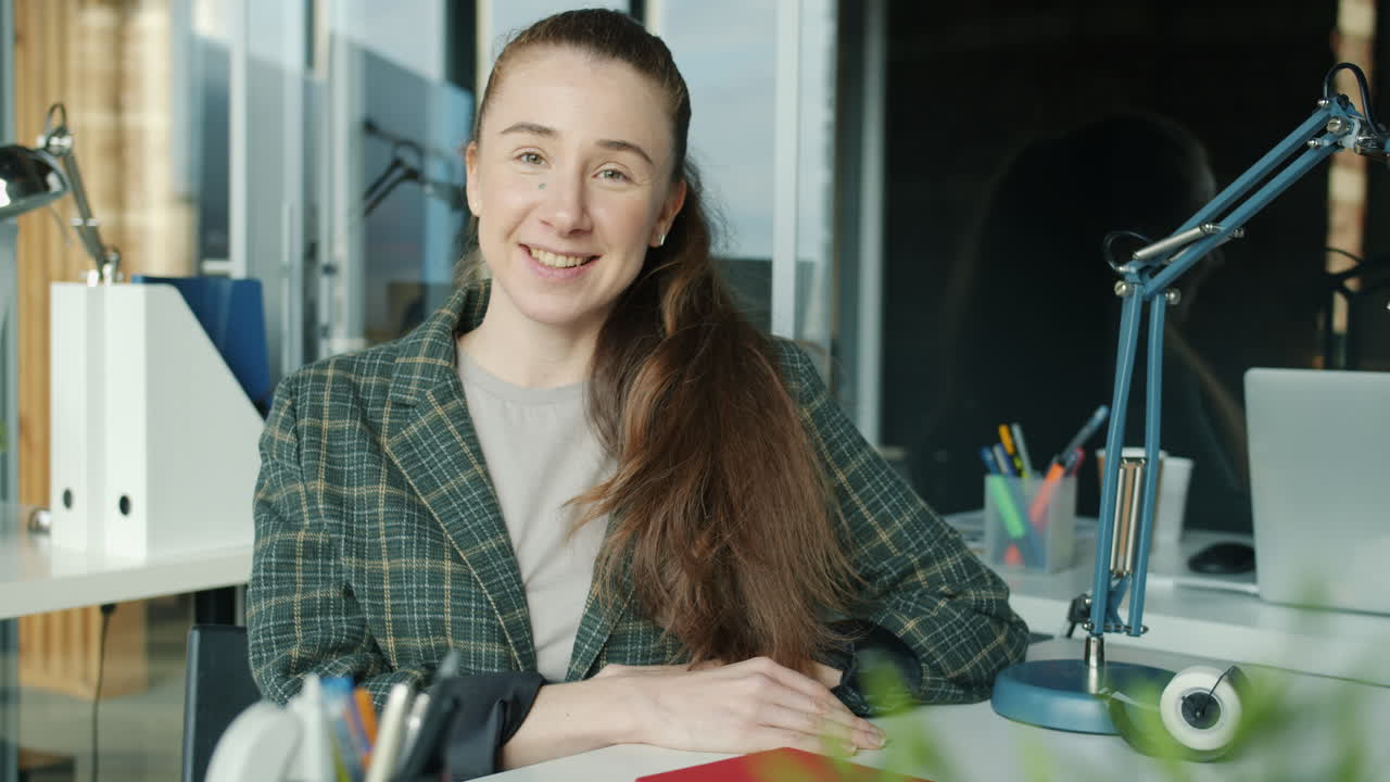 Woman Video Conferencing in Office