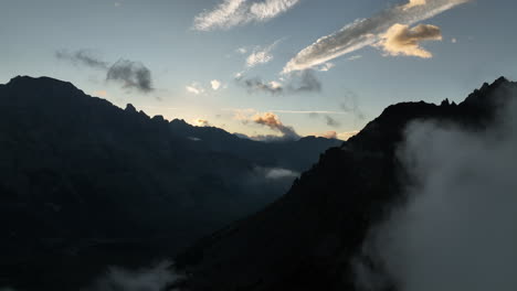 road-in-a-national-park-french-alps-drone-view-sunny-day-mountain-landscape