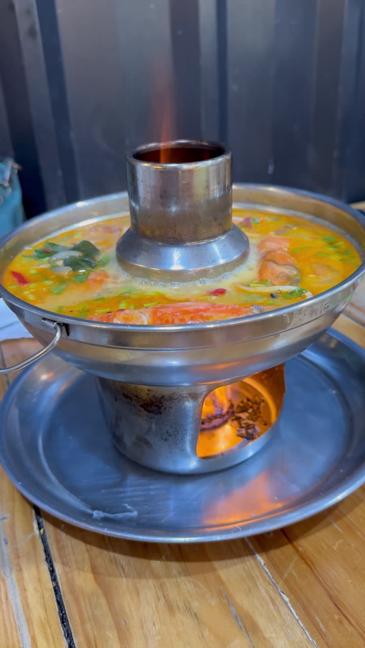 Tom Yum Soup in a Metal Pot with Fire