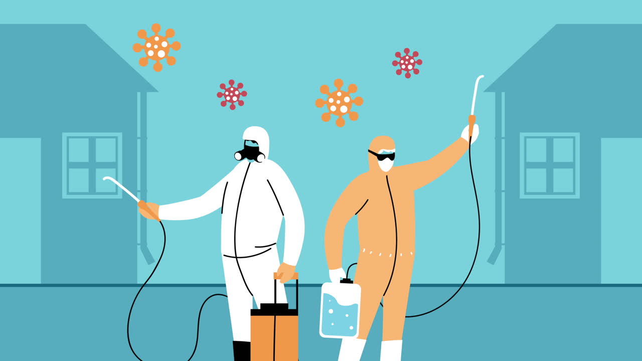 생물 안전복과 소독제 스프레이를 입은 직원