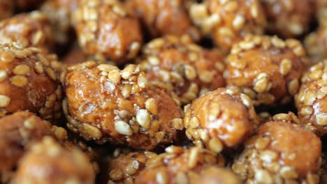 close-up of candied nuts with sesame seeds