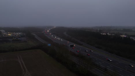 gloomy dangerous driving conditions foggy evening m11 motorway essex uk drone,aerial