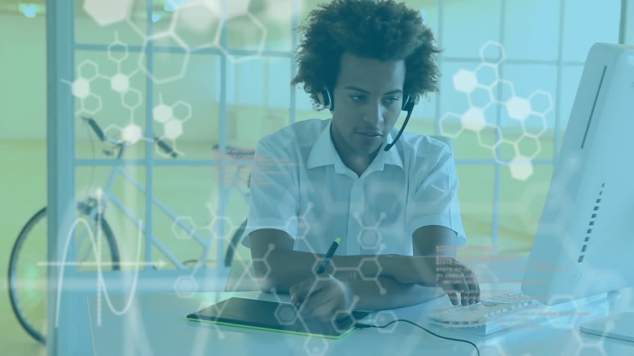 Animation of biracial man wearing headset using computer over statistics and data recording
