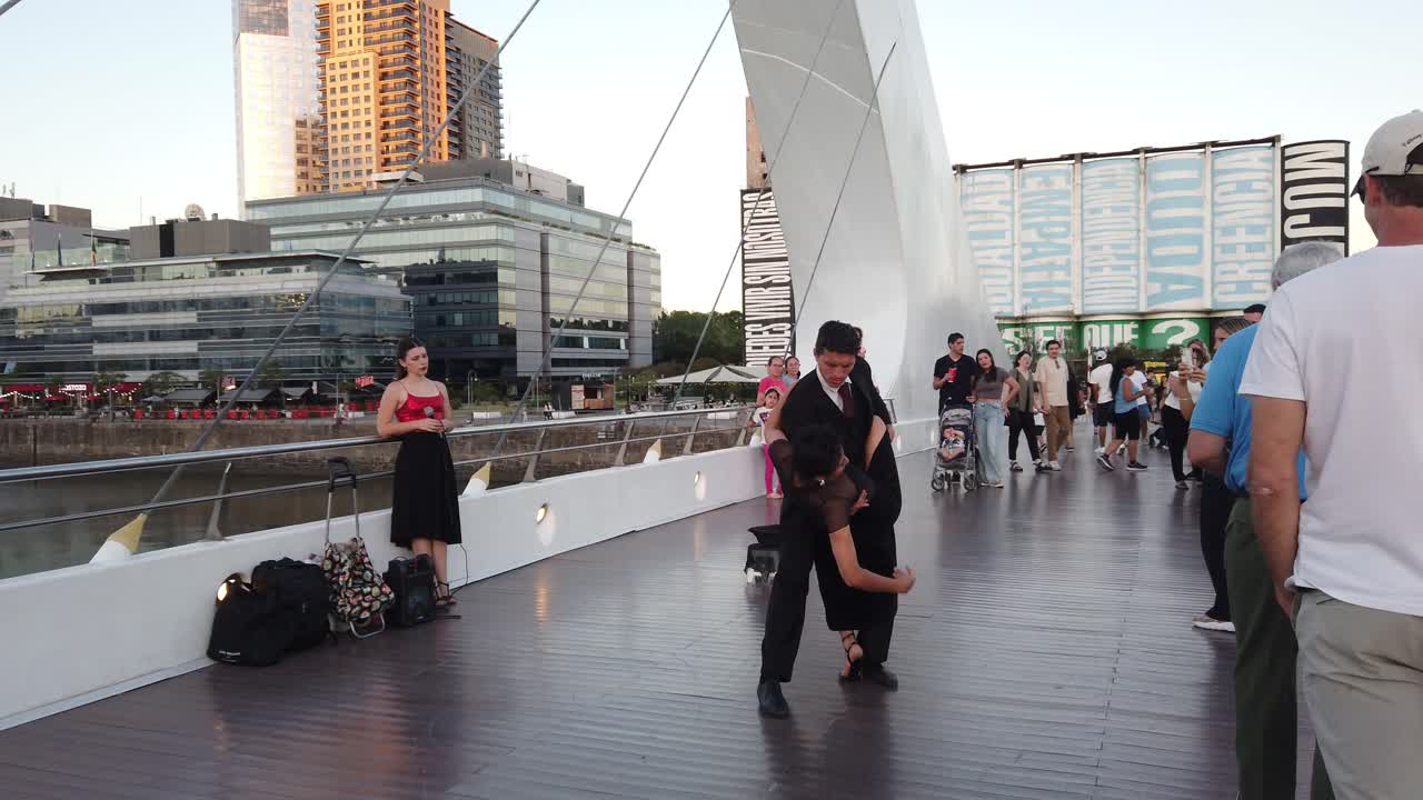 Tango Performance on a Modern Bridge in Buenos Aires