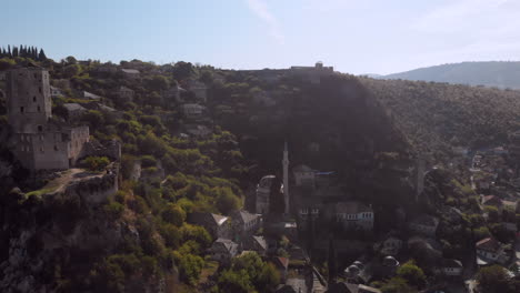 historic hillside village počitelj, bosnia and herzegovina, dramatic aerial