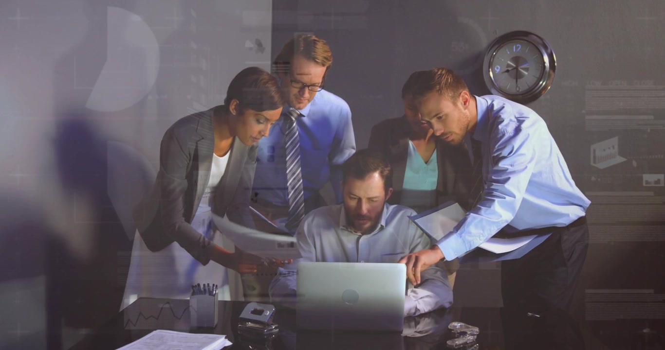 Seated man using laptop, woman showing reports urging team leaning, screen tags guiding biz review