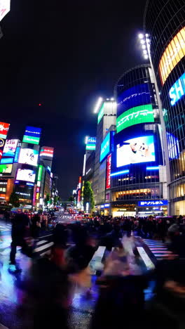 shibuya crossing at night in tokyo, japan
