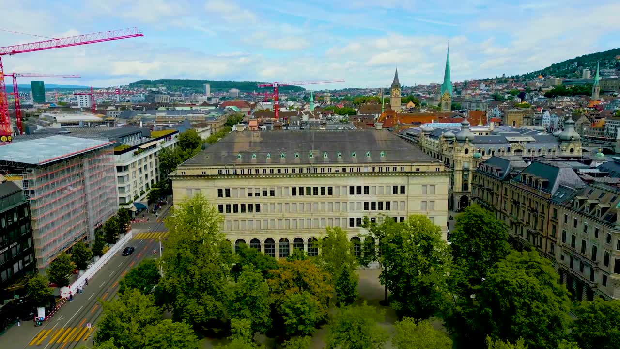 4K Drone Video of the Tour Boat Docks on Lake Zurich near Geiserbrunnen Monument Park in Downtown Zurich, Switzerland