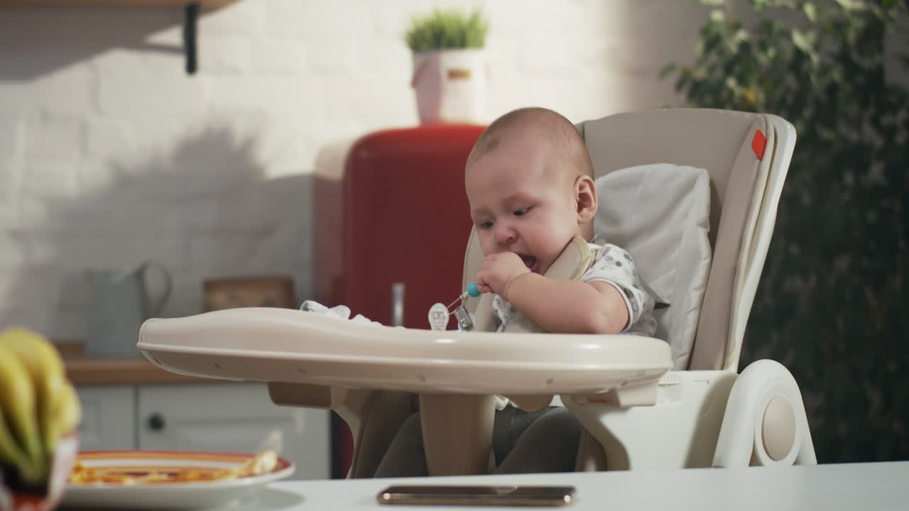 Baby Crying in High Chair During Mealtime