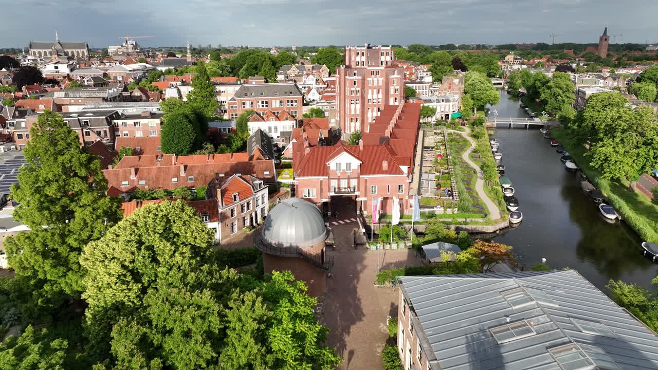 Aerial View of a City with Canals and Red Roofed Buildings