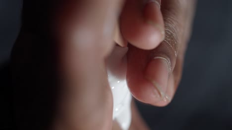 applying lotion on skin