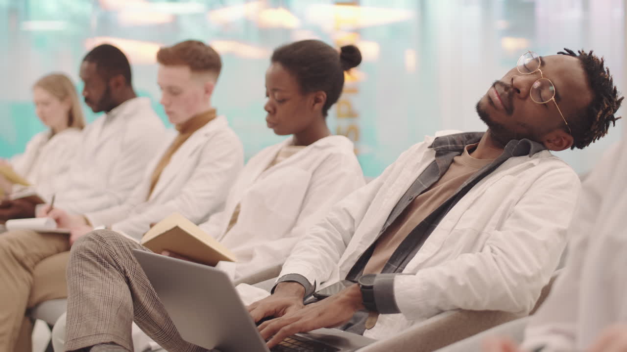 African-American Medical Student Napping in Class