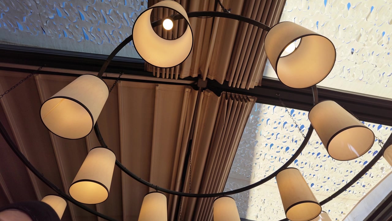 Modern Circular Chandelier Hanging in Elegant Interior Space