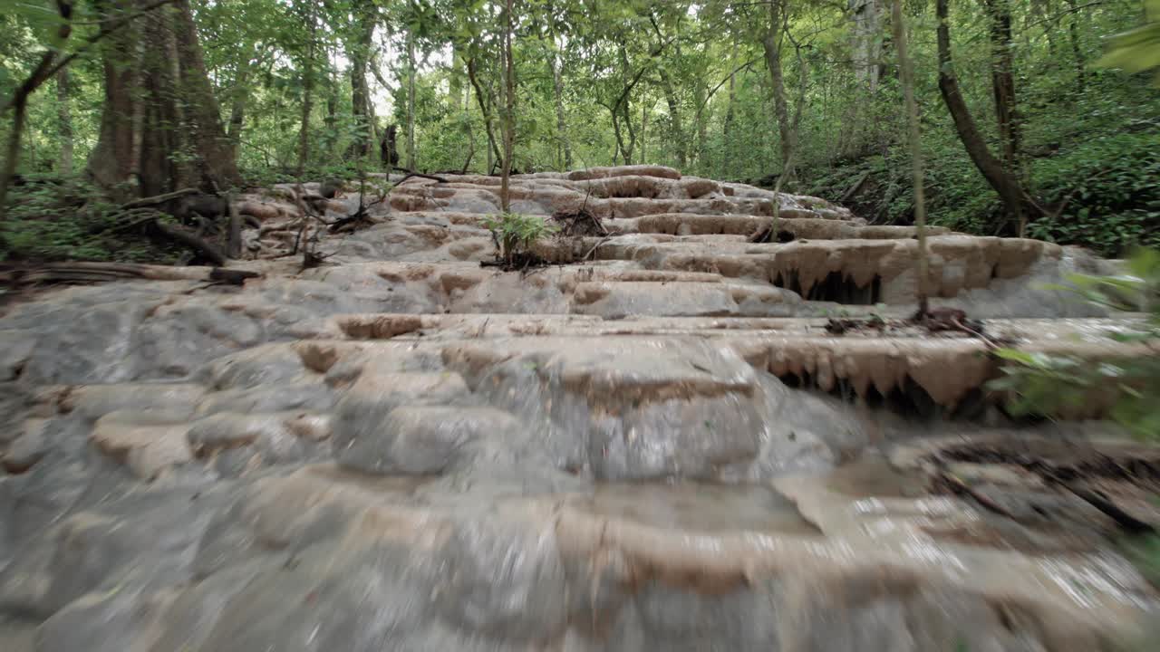 Backward shot of The extremely fragile karstic waterfalls of Barra Honda National Park, Costa Rica