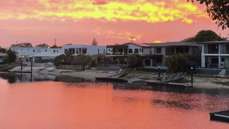 sunset over waterfront homes