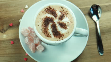 cappuccino with latte art and turkish delight