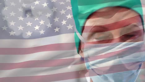 animation of waving usa flag over portrait of caucasian female surgeon in surgical mask at hospital