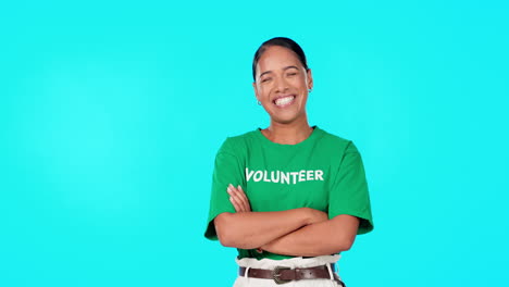 Volunteer,-charity-and-a-woman-on-a-blue