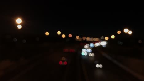 motorway traffic at night with bokeh effect