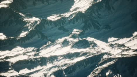 Aerial-view-of-the-Alps-mountains-in-snow