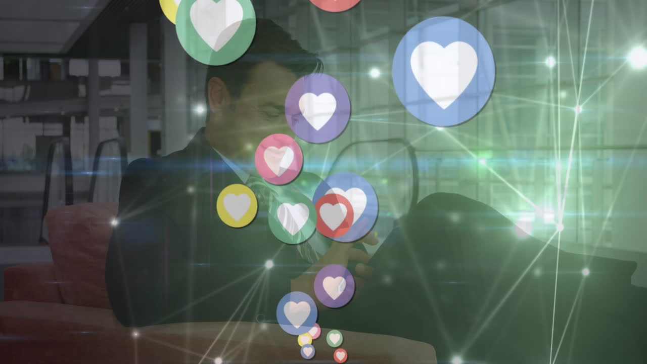 사무실에서 스마트폰을 사용하는 백인 사업가 위에 떠다니는 심장 아이콘의 애니메이션