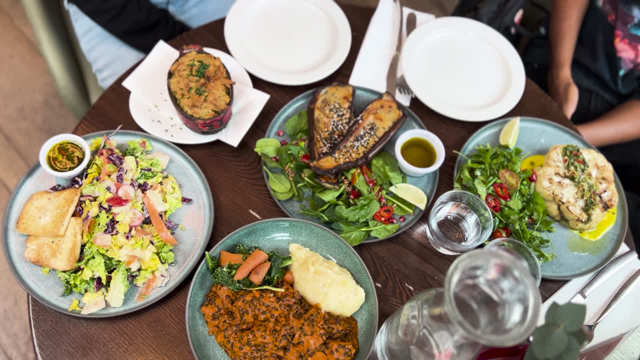 Organic Vegan Restaurant Table Full of Food