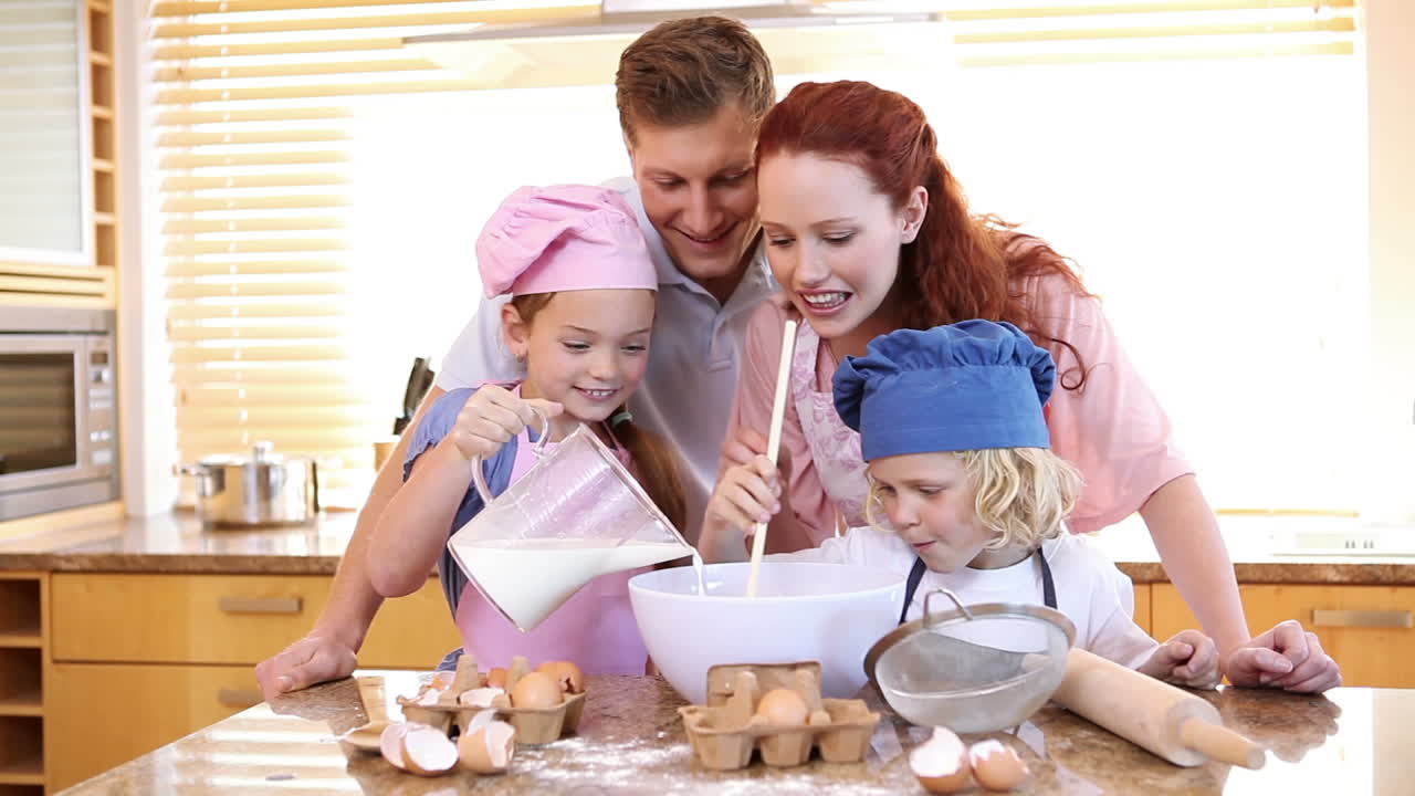Family making a cake