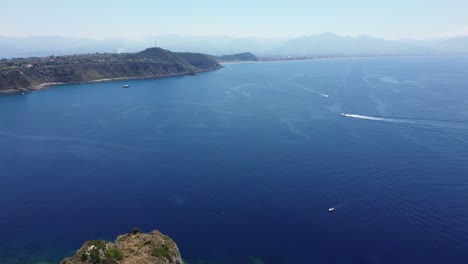 The-blue-beach-in-a-cinematic-drone-view-is-the-best-destination-to-travel