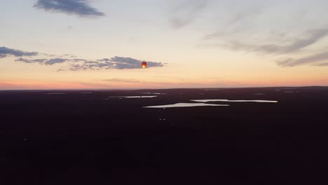 tracking drone shot a sky lantern over lochs on the isle of lewis