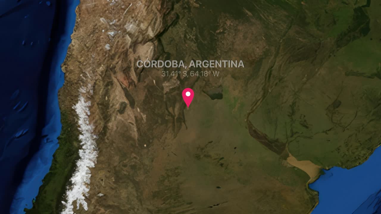 Representación digital de la Tierra que hace zoom desde un mapa mundial hasta Córdoba, Argentina, con un marcador de ubicación.
