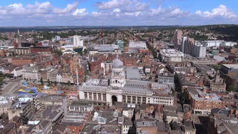 wide aerial drone orbiting shot round nottingham council house