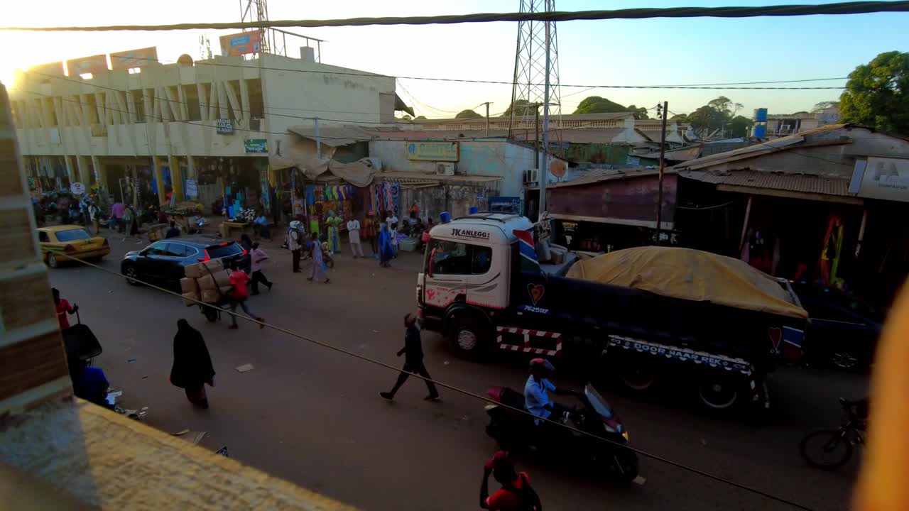 Busy Street Scene in an African City at Sunset