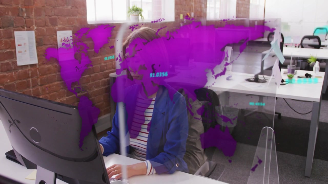 Businesswoman Working on Computer with Digital World Map Overlay