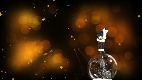 animation of snow falling over christmas snow globe with santa claus
