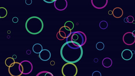 Vibrant-circles-form-a-colorful-pattern-on-dark-background