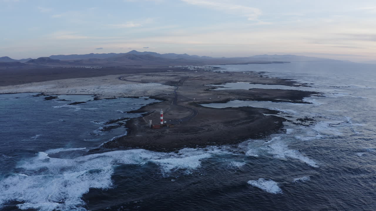 Aerial view of a lighthouse on a coastal island