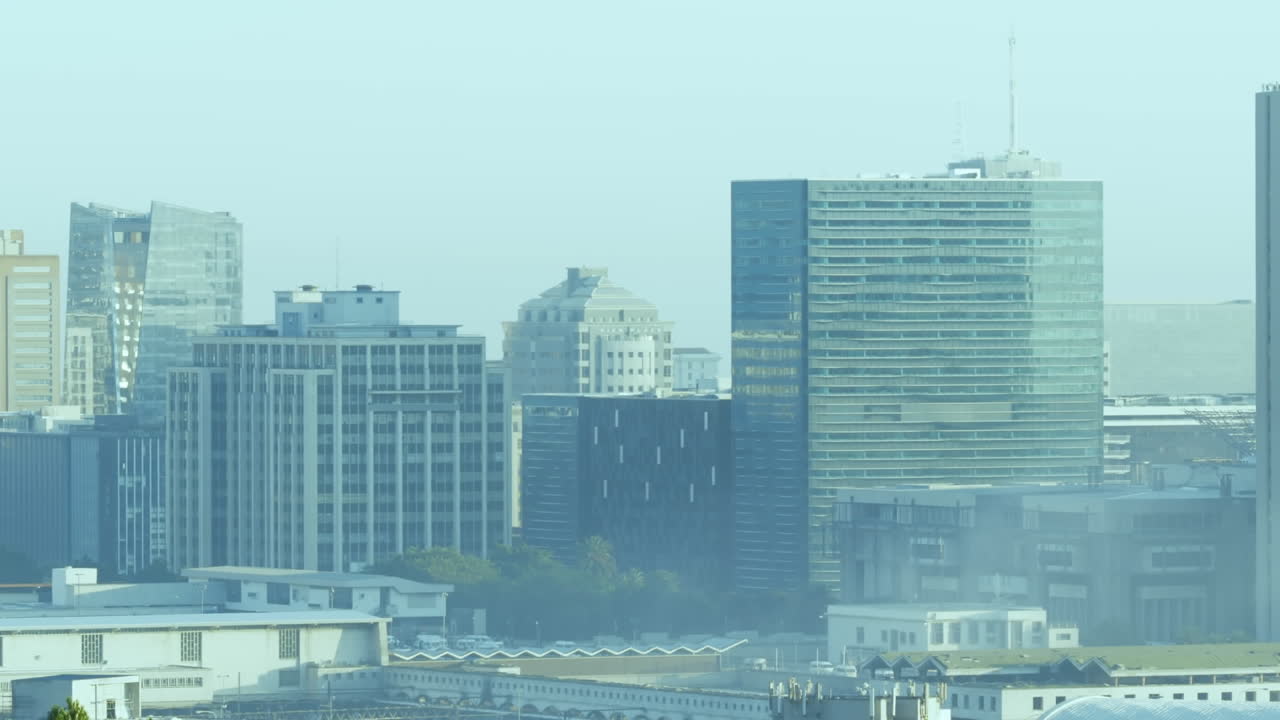 Animation of purple pattern over cityscape