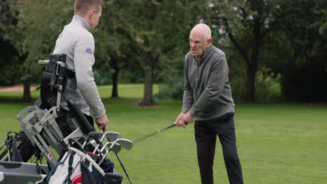 people playing golf on a golf course
