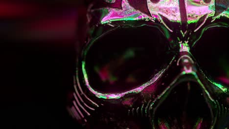 close-up of a neon glowing skull mask